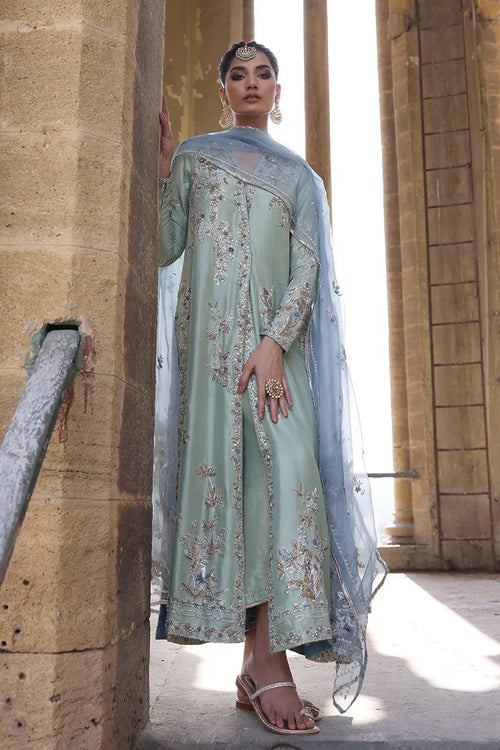 Eva Couture model in a hand-embellished Pakistani outfit