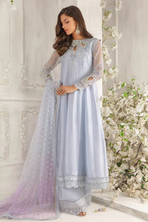 Eva Couture model in a hand-embellished Pakistani outfit