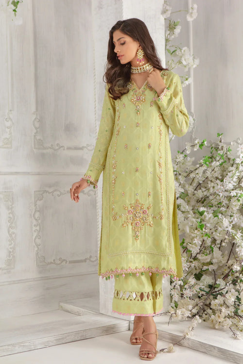 Eva Couture model in a hand-embellished Pakistani outfit