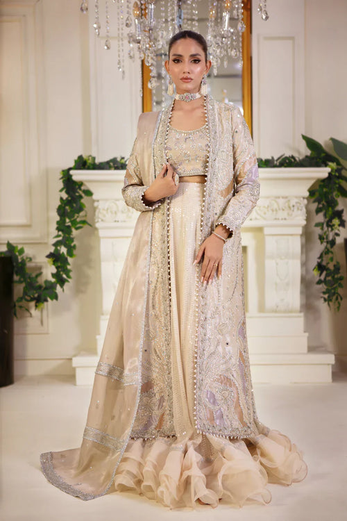 Eva Couture model in a hand-embellished Pakistani outfit