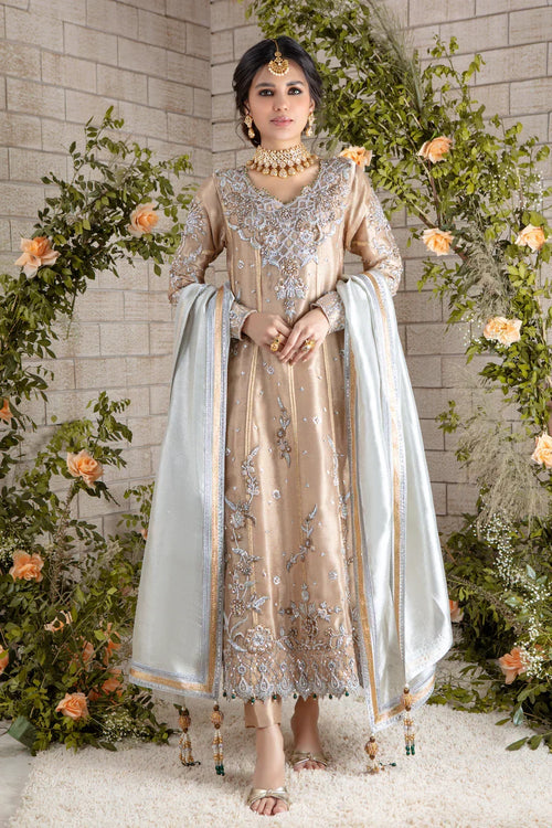 Eva Couture model in a hand-embellished Pakistani outfit