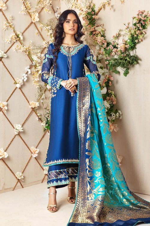 Eva Couture model in a hand-embellished Pakistani outfit